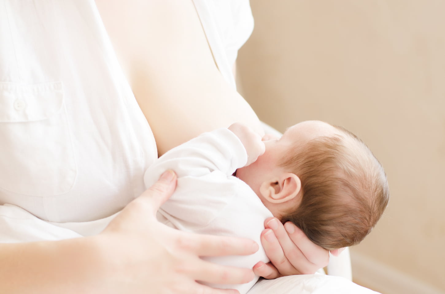 young mom breastfeeding her little baby boy 2021 08 26 22 41 03 utc 1