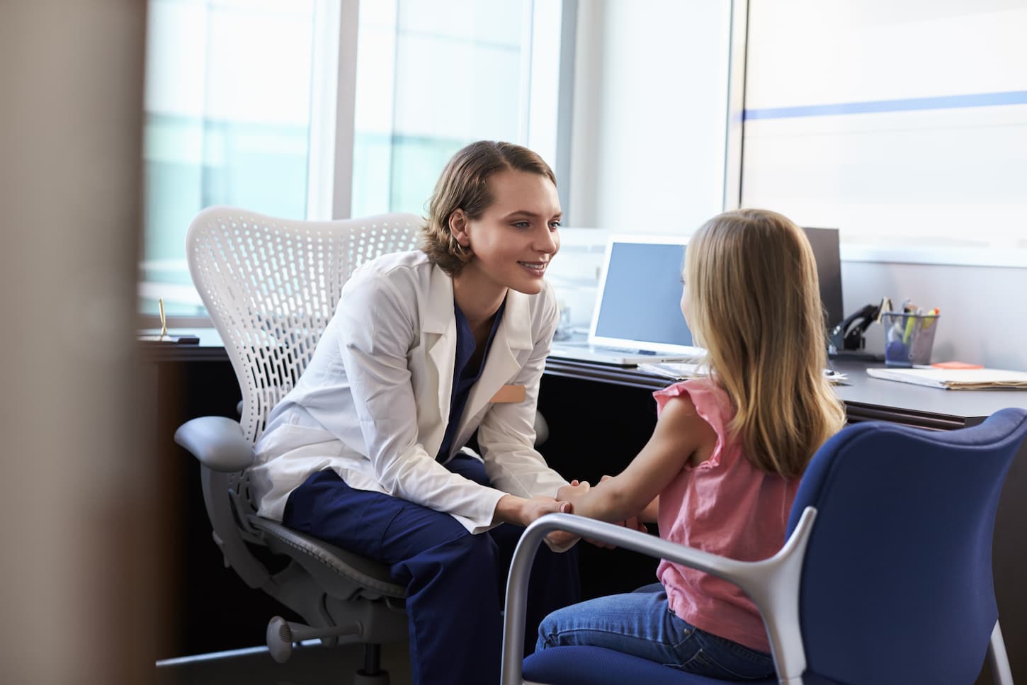 An image of a Pediatrician Talking To a Child In Hospital.